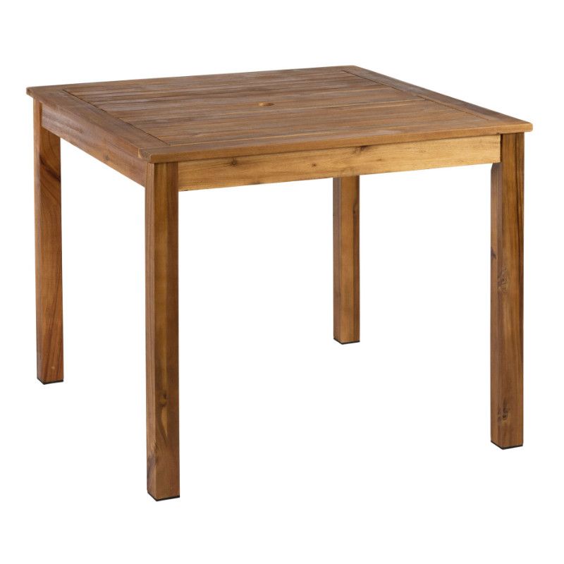 Close-up of a square Hardy Dining Table, showcasing its wood grain, durable design and robust construction from a low angle.