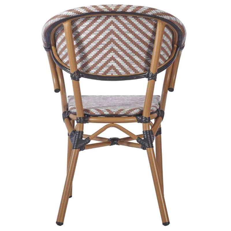 Rear view of the Montpellier Armchair featuring a brown wicker seat and backrest with a metal frame perfect for outdoor settings.