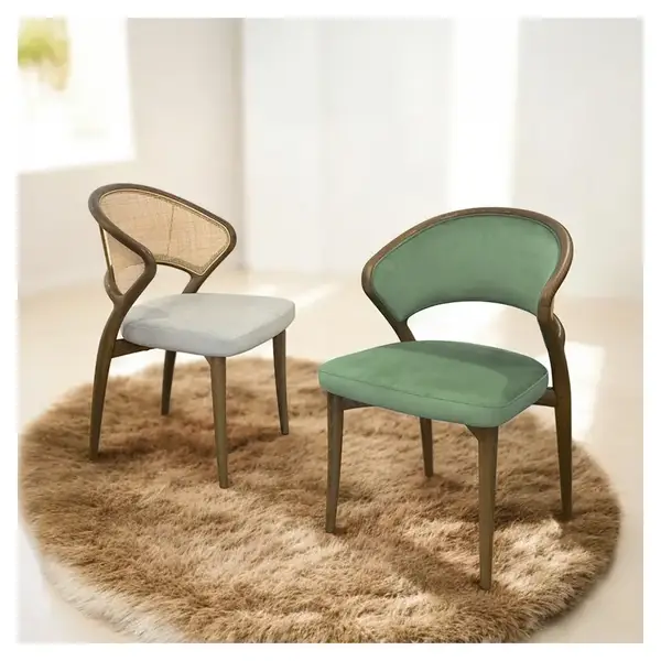 Nob side chairs: one upholstered in green, the other in light gray, both with wooden frames, on a brown rug. Stackable, comfy.