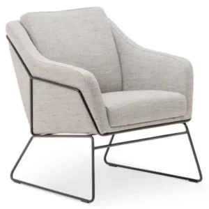 Angled view of the Fiji Lounge Chair, featuring light upholstery, closed armrests and a black metal sled base.