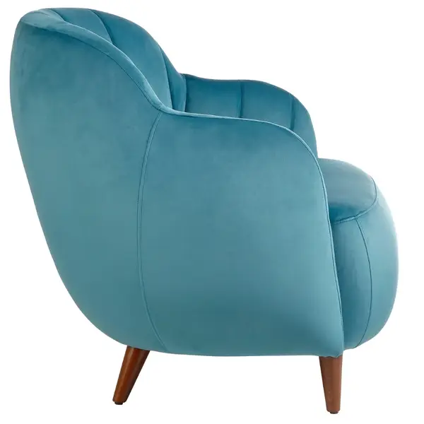 Side view of a Glamour Lounge Chair in teal upholstery with tufted back and arms, on wooden legs. Modern accent chair.