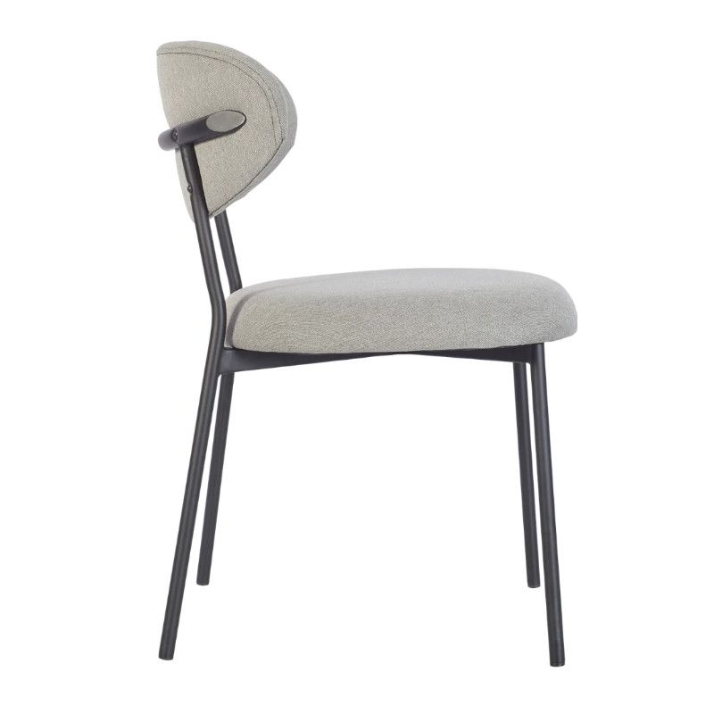 Side view of the upholstered Joe M Side Chair in light gray with a black metal frame, showcasing its modern design.