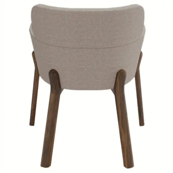 Rear view of a beige upholstered Selene Armchair with wooden frame, showcasing its modern design and sturdy construction.