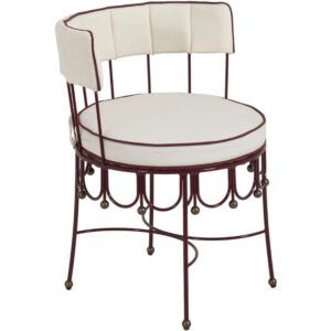Maroon armchair with a decorative metal frame, off-white upholstered seat and back, and contrast piping details.