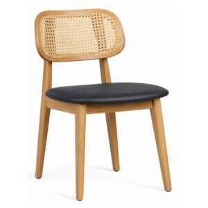 Bunny Cane side chair with light wooden frame, woven cane backrest, and comfortable black upholstered seat.