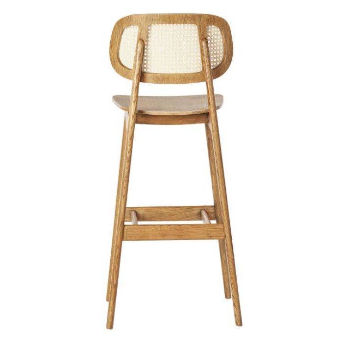 Rear view of the Bunny W Cane Barstool showcasing its curved timber frame, natural woven back inlay, and four-leg base.