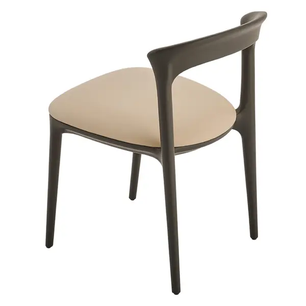 Rear-three-quarter view of the Fau Side Chair, showcasing its dark wood frame and smooth, cream-colored upholstered seat.