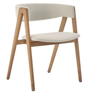 Gala Armchair with light fabric upholstery and a natural wooden frame in a modern, three-quarter view.