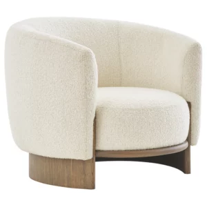 Hug Lounge Chair in cream textured fabric with a curved wooden base, shown from a side angle.