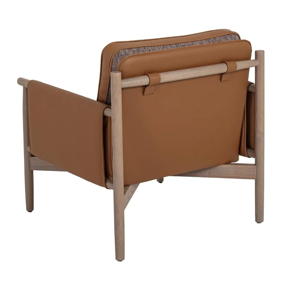 Back view of the Merinal lounge chair showing tan upholstery details, fabric trim, and a light wood four-legged frame.