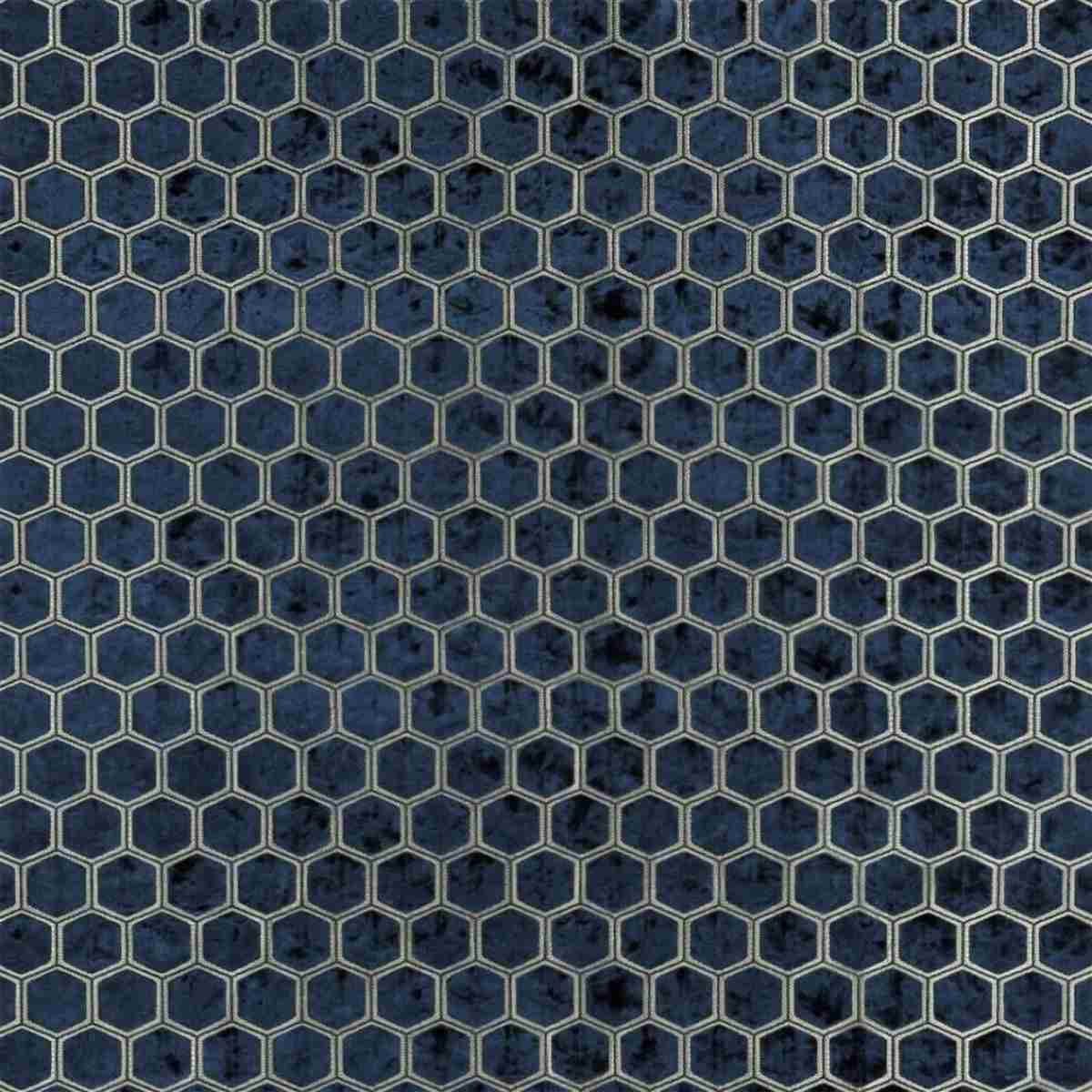 Patterned-velvet Navy blue patterned velvet fabric featuring a repeating white geometric honeycomb grid with a mottled texture.
