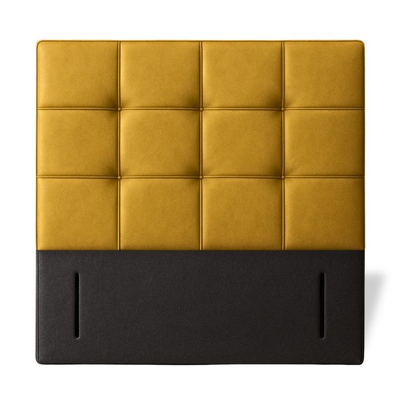 Square quilted single headboard in gold fabric with a black leather base and vertical mounting slots, front view.
