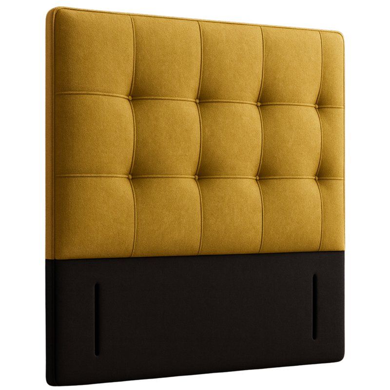 Close-up perspective of a mustard yellow Boarder Square Quilted Single Headboard with a dark, solid base.