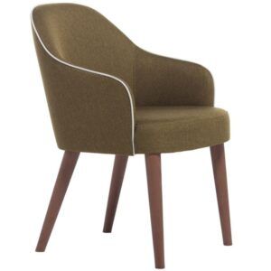 Carmen Armchair in olive green fabric with white piping and tapered wooden legs, shown from a side angle.