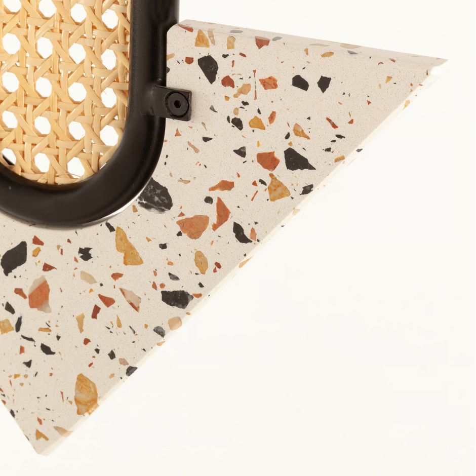 Macro view of Frame Medium Pendant Light showing the precise junction where the rattan weave meets the terrazzo stone.