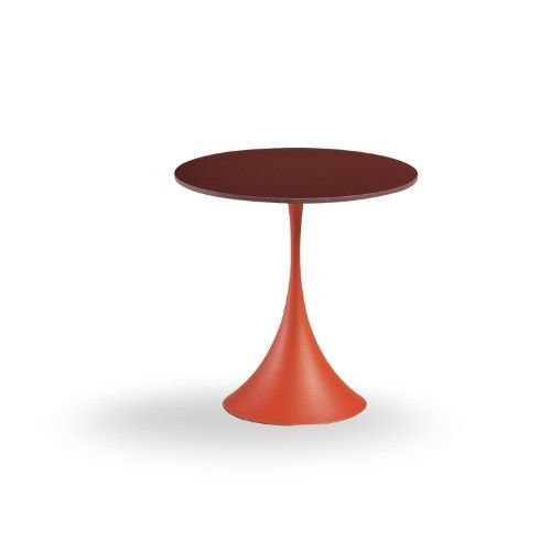 Leo round dining table with a dark brown circular top and a bright orange sculptural pedestal metal base.