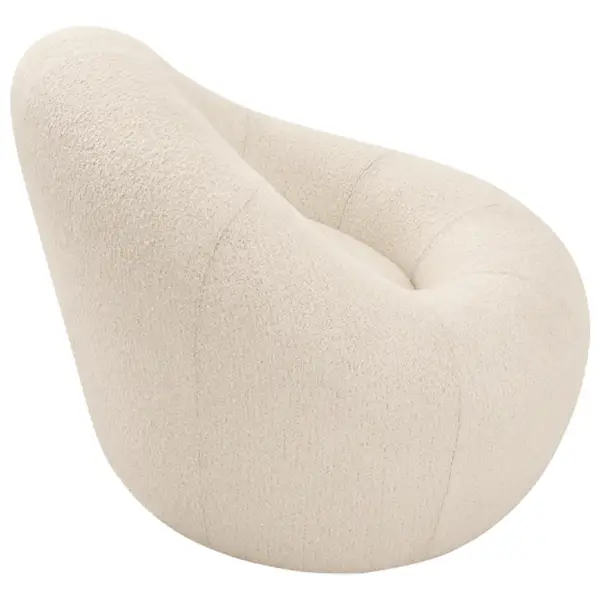 Side view of the Loop Sofa, showcasing its organic, flowing silhouette and plush neutral upholstery on a white background.