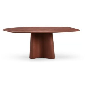 Organic Dining Table with a terracotta-colored concrete top and sculptural pedestal base on a white background.
