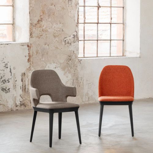 Two Relay Side Chairs displayed together: one with a taupe cutout armrest and another featuring an orange upholstered back.