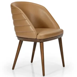 Amara armchair shown from a front-side angle, highlighting the curved, tan-upholstered seat and sturdy dark wood base.