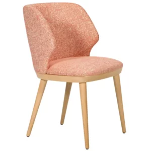 Front side view of the Ariella armchair showcasing a curved coral fabric seat and sturdy natural light wood legs.