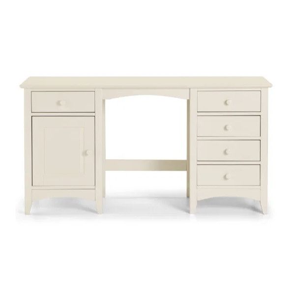 Studio shot of the Cameo dressing table featuring a neutral cream palette, symmetrical storage drawers, and arched base.