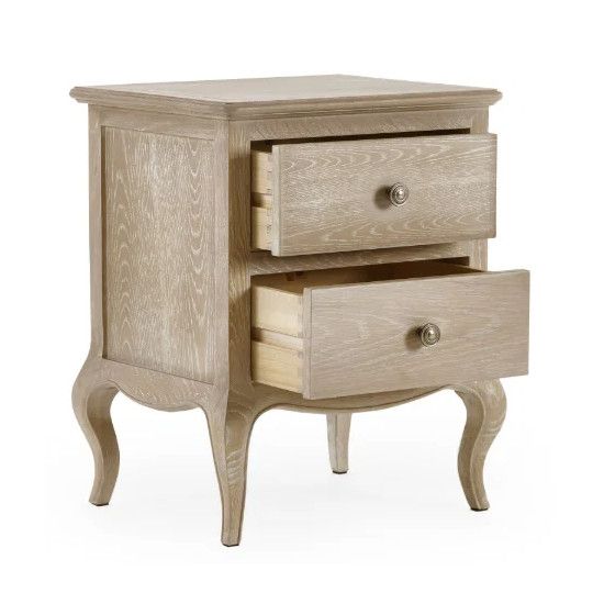 Camille bedside table in oak finish with two drawers partially open, featuring traditional cabriole legs on white.