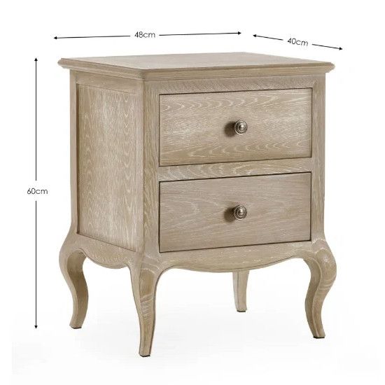 Front view of Camille bedside table showing dimensions with two drawers, light wood grain, and curved legs on white.