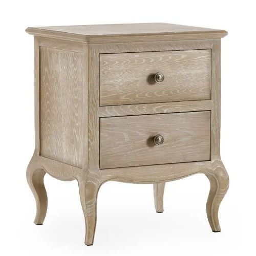 Camille bedside table in light wood finish with two drawers, curved cabriole legs, and metal knobs, studio view.