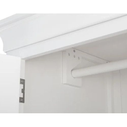Detail view of the Camille wardrobe interior, highlighting the sturdy wooden hanging rail mounting and crown molding.