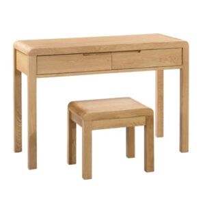 Curve desk table in natural light oak wood with two drawers and a matching square stool, studio shot on white.
