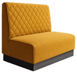 Mustard yellow Diamond Quilt Plinth Banquette with a diamond-patterned upholstered back and dark wood plinth base.