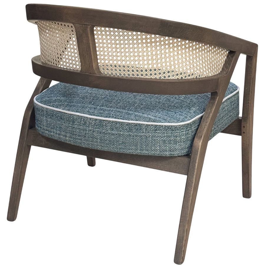 Rear view of the Florence Cane Lounge Chair showing the curved wooden frame, rattan backrest, and textured blue seat.