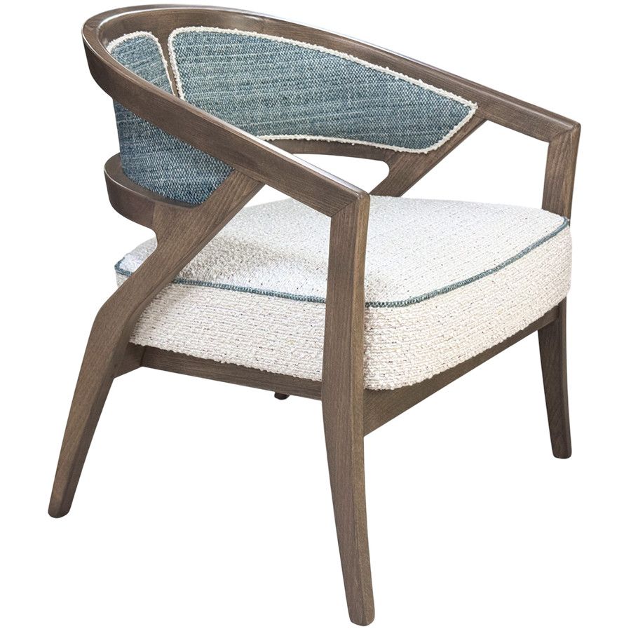 Three-quarter angle view of the Florence lounge chair, highlighting its curved wood frame and teal-upholstered backrest.