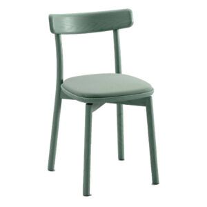 Sage green Fondina side chair featuring a solid timber frame and matching upholstered seat in a three-quarter view.