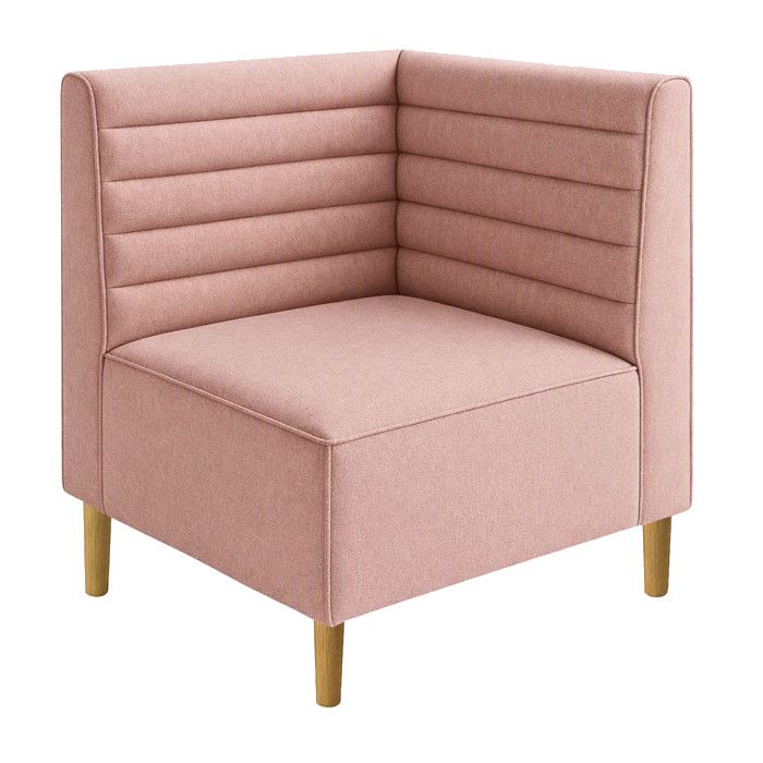Corner view of a blush pink horizontal flute bench banquette featuring upholstered seating and natural wood legs.