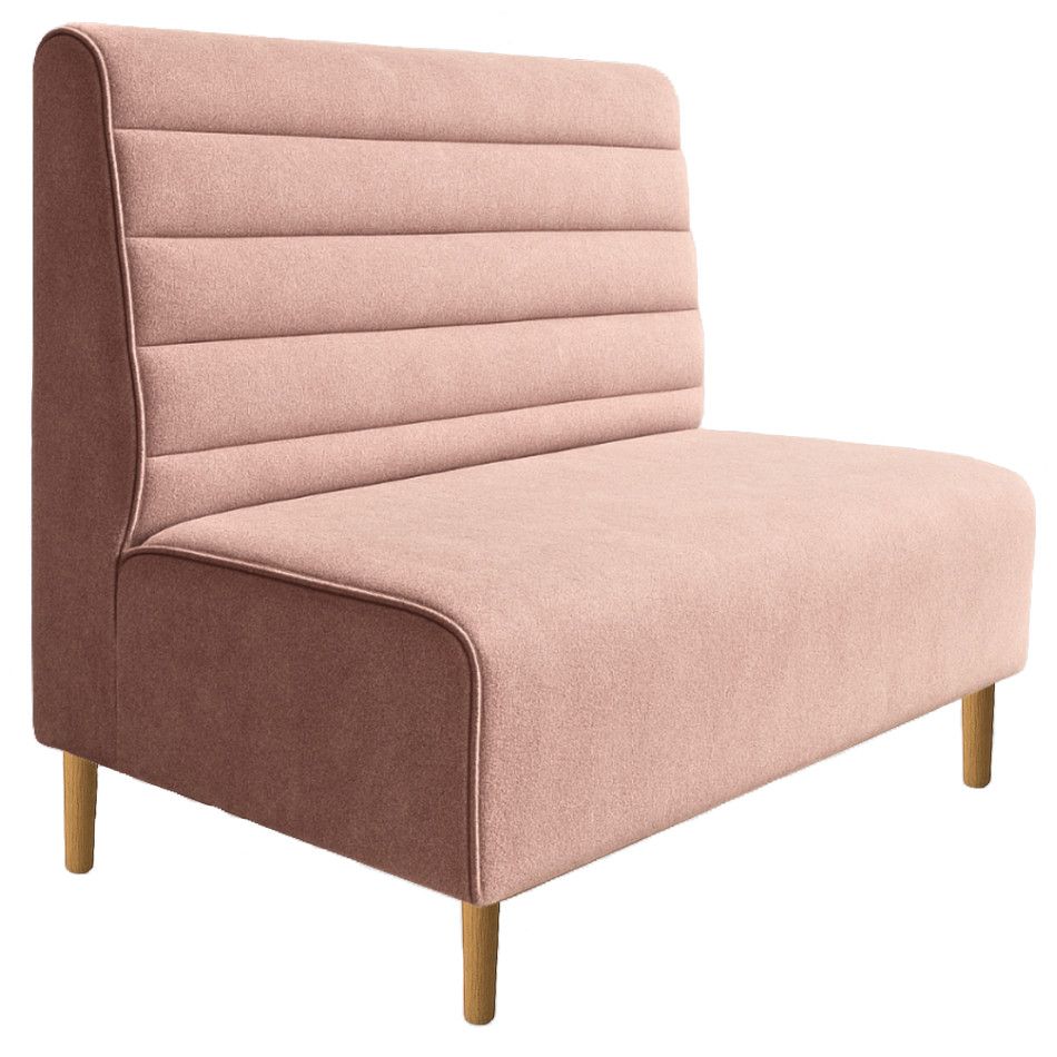Pink upholstered horizontal flute bench banquette with a high back and light wooden legs, shown from a side angle.