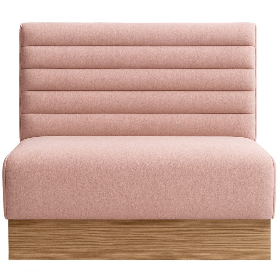 Front view of a horizontal flute banquette in soft pink fabric, set on a sturdy light wood grain plinth base.