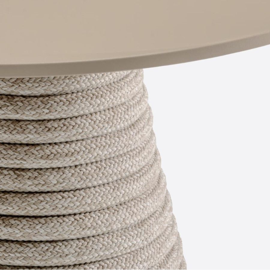 Close-up perspective of the Ikon Twist dining table base, highlighting the thick, woven light-toned rope coil detail.