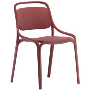 A terracotta red Libre Side Chair, featuring a minimalist, stackable polypropylene design with a curved four-leg frame.