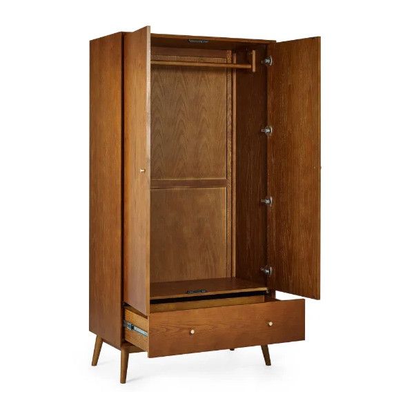 Interior view of the Lowry wardrobe, displaying the wooden hanging rail, upper shelving, and an open bottom drawer.