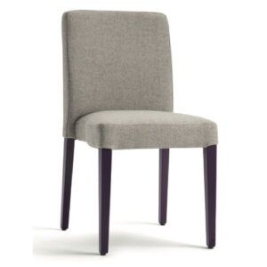 Miss Stacking Side Chair with beige upholstered seat and back on a dark four-legged wooden frame, studio view.
