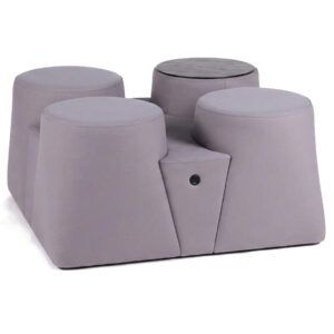 Ada Block Pouf in light grey upholstery with four seats and integrated dark table surface, angled view.