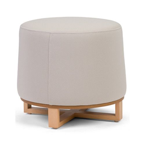 Ballet Low Stool with light beige upholstered round seat and wooden cross base, studio side view.