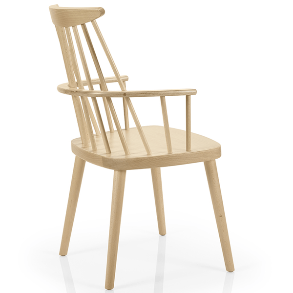 Bam W Armchair in light wood, side profile showing spindle back, curved arms, and four tapered legs.