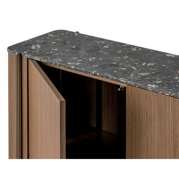 Close-up of the Blume 2 Sideboard showing its dark terrazzo top and open cabinet door revealing interior wood finish.