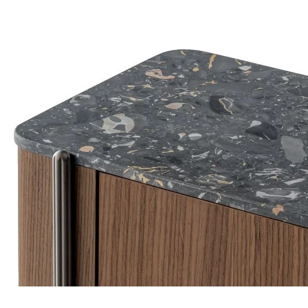Top corner detail of the Blume 2 Sideboard, highlighting the textured grey terrazzo surface and warm wooden cabinet.