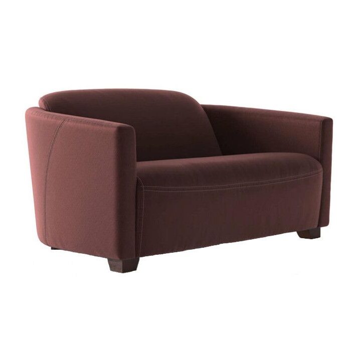 Bristol sofa in a rich burgundy fabric with a modern, curved backrest and solid dark wood legs, studio view.