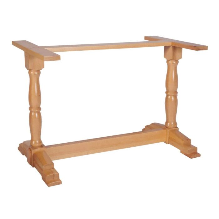 Cannon Twin Coffee Table Base in natural wood with turned pedestal legs and trestle feet, angled view