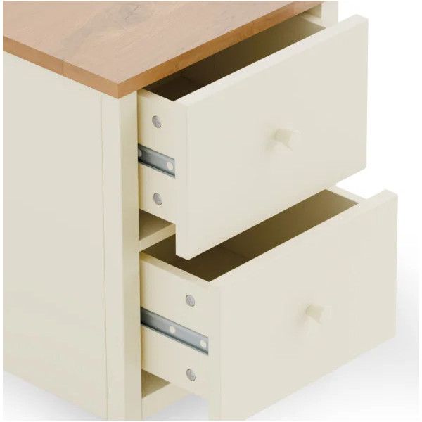 Ivory and oak Coxmoor 2 drawer bedside showing open drawers with internal metal slide mechanisms from a side angle.